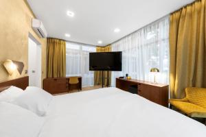 Postel nebo postele na pokoji v ubytování Rixwell Collection Seaside Hotel Jurmala
