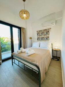 Katil atau katil-katil dalam bilik di Marios apartments