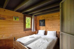 Hof Keppel, der stromlose Urlaubにあるベッド