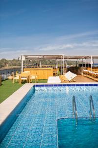 a swimming pool on the roof of a building at Nile Capital Cruise - Every Monday from Luxor or Friday from Aswan in Luxor