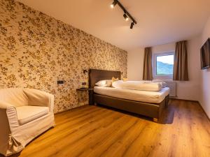Postel nebo postele na pokoji v ubytování NEW! Tevini Alpine Apartments by we rent
