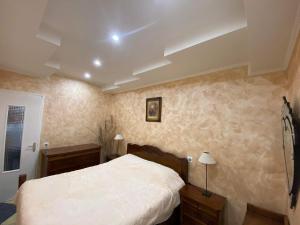 Posteľ alebo postele v izbe v ubytovaní Charmant appartement au cœur de Tarascon