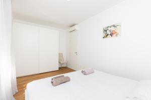 Katil atau katil-katil dalam bilik di Nava-Apartment with beutiful view and garage space