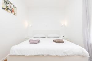 Katil atau katil-katil dalam bilik di Nava-Apartment with beutiful view and garage space