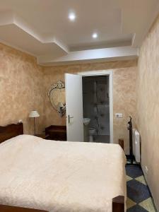 Posteľ alebo postele v izbe v ubytovaní Charmant appartement au cœur de Tarascon