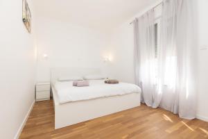 Katil atau katil-katil dalam bilik di Nava-Apartment with beutiful view and garage space