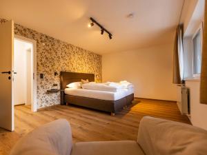 Postel nebo postele na pokoji v ubytování NEW! Tevini Alpine Apartments by we rent
