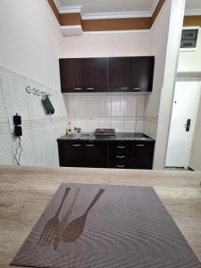 Kuchyň nebo kuchyňský kout v ubytování Apartman IN