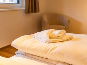 Postel nebo postele na pokoji v ubytování NEW! Tevini Alpine Apartments by we rent