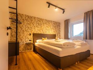 Postel nebo postele na pokoji v ubytování NEW! Tevini Alpine Apartments by we rent