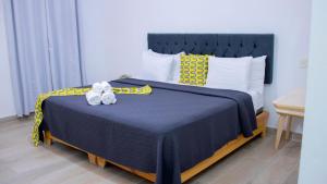 Voodi või voodid majutusasutuse Hotel Capriccio Mare y Restaurante toas
