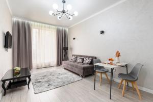 Posezení v ubytování С видом на горы привлекательная квартира