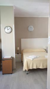 Кровать или кровати в номере Piccolo hotel holiday center