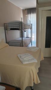 Кровать или кровати в номере Piccolo hotel holiday center