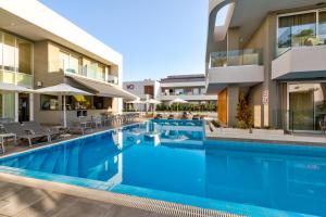 an image of a swimming pool at a hotel at White Olive Premium Laganas in Laganas