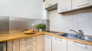 Køkken eller tekøkken på Osiedle Bursztynowe + 14 billeder