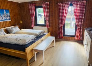 Postel nebo postele na pokoji v ubytování Vedders Berghütte