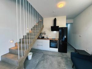Kuchyň nebo kuchyňský kout v ubytování Zoha Villas