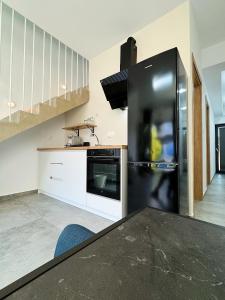 Kuchyň nebo kuchyňský kout v ubytování Zoha Villas