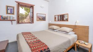 En eller flere senge i et værelse på Petrino - Cosy apartment!