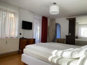 Ένα ή περισσότερα κρεβάτια σε δωμάτιο στο Appartement mit Terasse
