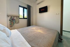 Postel nebo postele na pokoji v ubytování Zoha Villas