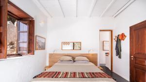 En eller flere senge i et værelse på Petrino - Cosy apartment!