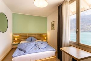 Postel nebo postele na pokoji v ubytování Seehotel Sternen