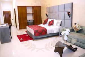 Letto o letti in una camera di Hôtel AL QAISAR