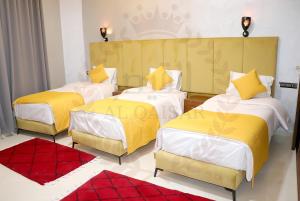 Letto o letti in una camera di Hôtel AL QAISAR