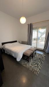 Ένα ή περισσότερα κρεβάτια σε δωμάτιο στο Villa Le Cap Beddouza