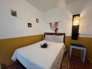 Un ou plusieurs lits dans un hébergement de l'établissement Casa del viajero Antigua