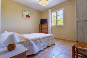 Postel nebo postele na pokoji v ubytování La Maison de Mathis - Maison avec piscine privée