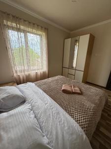 Ένα ή περισσότερα κρεβάτια σε δωμάτιο στο Rent House Byurakan