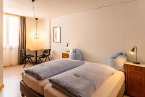 Postel nebo postele na pokoji v ubytování Seehotel Sternen