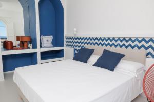 Letto o letti in una camera di La Maison De La Ville