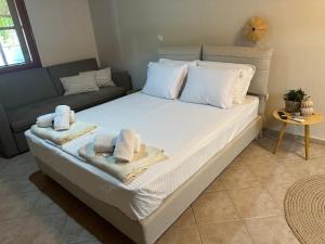 Postel nebo postele na pokoji v ubytování AB Apartments