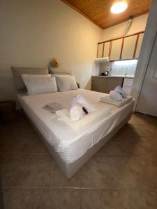 Postel nebo postele na pokoji v ubytování AB Apartments