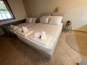Postel nebo postele na pokoji v ubytování AB Apartments + 6 fotografií