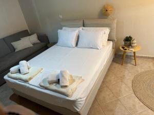 Postel nebo postele na pokoji v ubytování AB Apartments