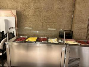 Kuchyň nebo kuchyňský kout v ubytování Hotel Hidalgo