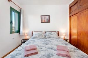 Postel nebo postele na pokoji v ubytování Casa Laly