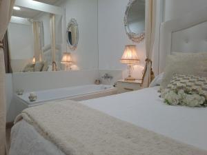 Łóżko lub łóżka w pokoju w obiekcie Apartamento Romero Garden B