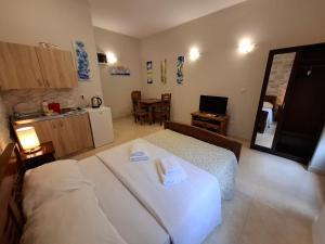 Filip Deluxe Rooms客房内的一张或多张床位