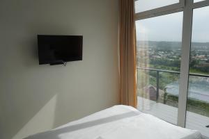 Et tv og/eller underholdning på Домик 2 Kok Tobe Village