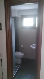 Koupelna v ubytování Hotel Villa Tasko