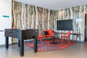Μια τηλεόραση ή/και κέντρο ψυχαγωγίας στο Best Western Plus Park City Lund