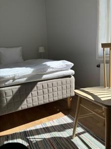 Postel nebo postele na pokoji v ubytování Bo i Bodafors + 3 fotografie