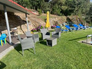 Um jardim no exterior de Quintinha de Pinouco