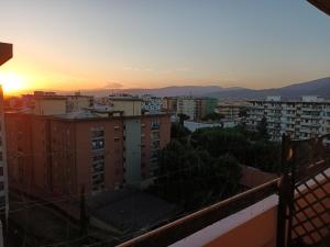 a sunset over a city with tall buildings at Joseph's house in Florence